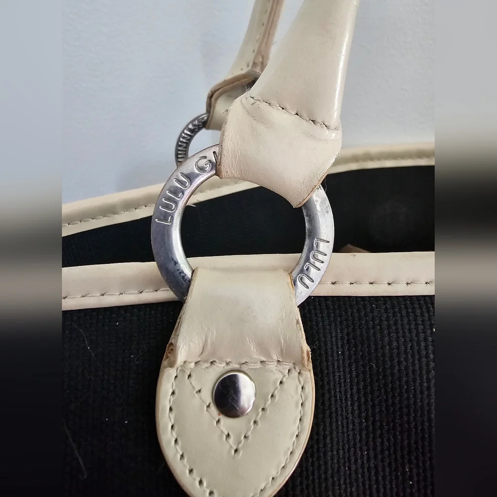 Elegant Lulu Guinness black canvas and beige leather trim shoulder bag